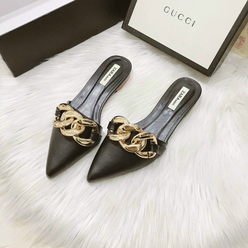 Sục mũi nhọn đế bệt khuy xích xoắn to da lì