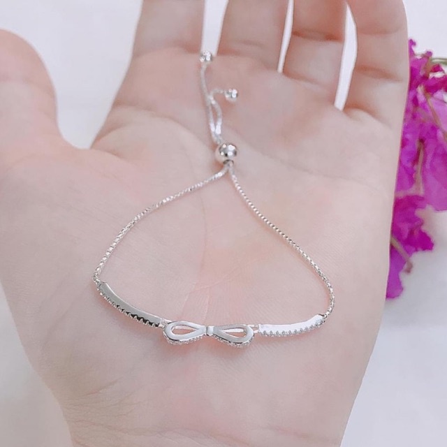 Lắc tay nữ bạc ta nơ siêu xinh, thiết kế dây rút điều chỉnh theo cỡ tay Mainomi Shop Bạc Xinh
