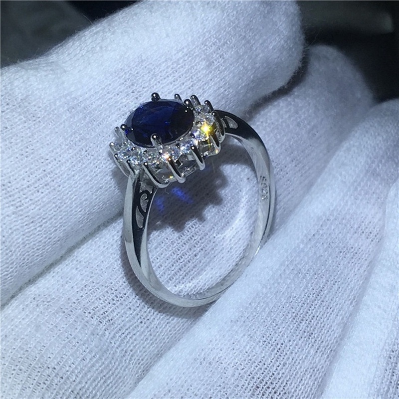 Nhẫn đính hôn đính đá Sapphire kiểu hoàng gia