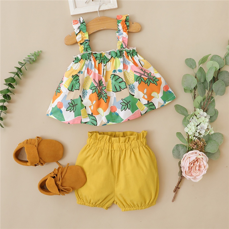 Set đồ 2 mảnh Mikrdoo gồm áo hai dây in hình hoa + quần short màu vàng phong cách mùa hè thời trang cho bé gái