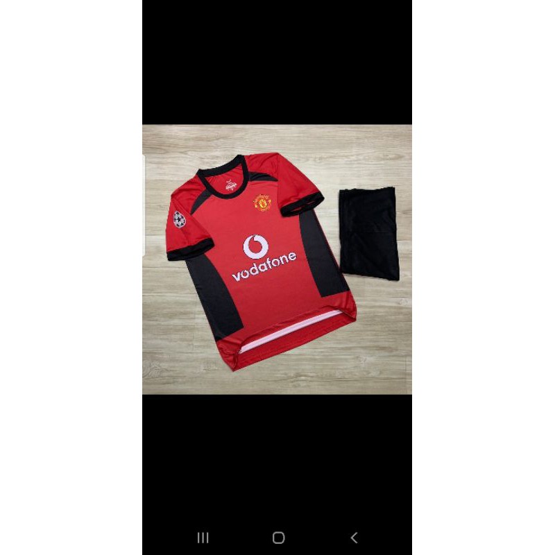 Áo đá bóng Mu Vodafone