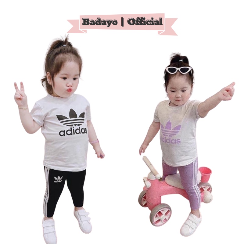 Đồ bộ bé gái set thể thao áo thun trắng cộc tay kèm quần dài đen phối sọc chất cotton hàng quảng châu BADAYO SL1196