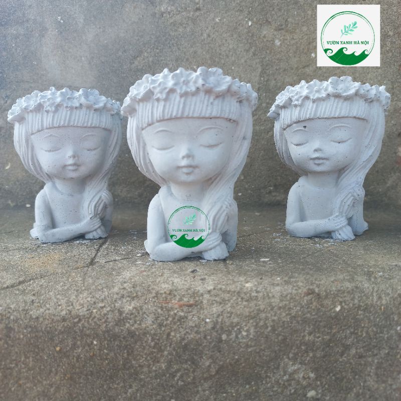 Chậu xi măng trồng sen đá, xương rồng hình cô gái tóc dài đội hoa