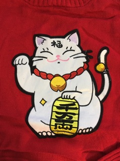 Áo len mèo thần tài