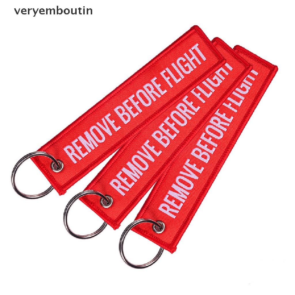 Móc khóa vải polyester thêu họa tiết chữ Remove Before Flight cỡ 13*3CM