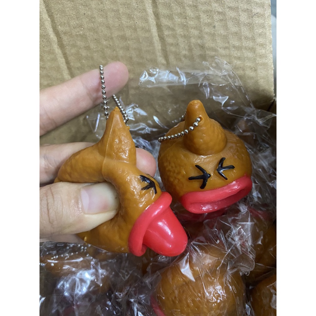 Móc khóa hình cục shit bóp lè lưỡi đồ chơi giải trí vui nhộn squishy cực hay