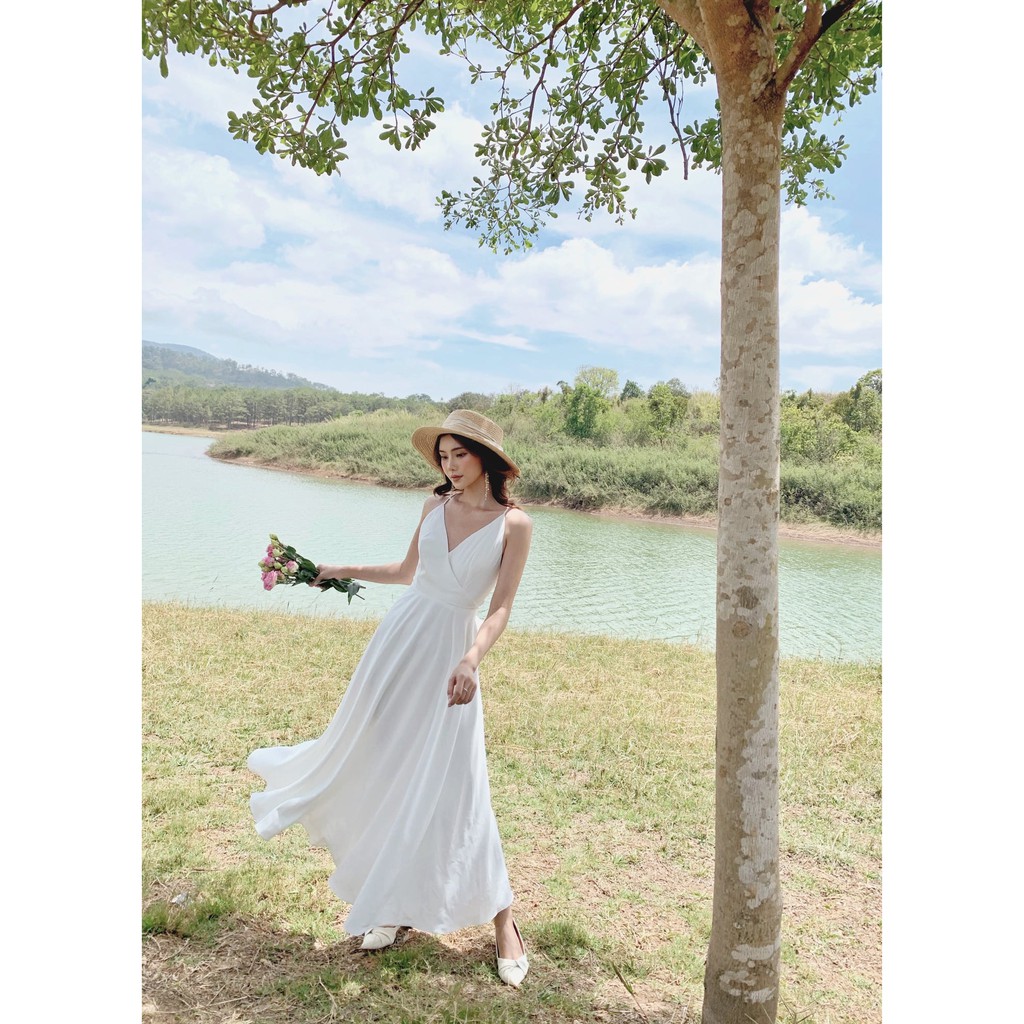 TIIN STORE Váy trắng 2 dây đan chéo nơ lưng by Tiin | BigBuy360 - bigbuy360.vn