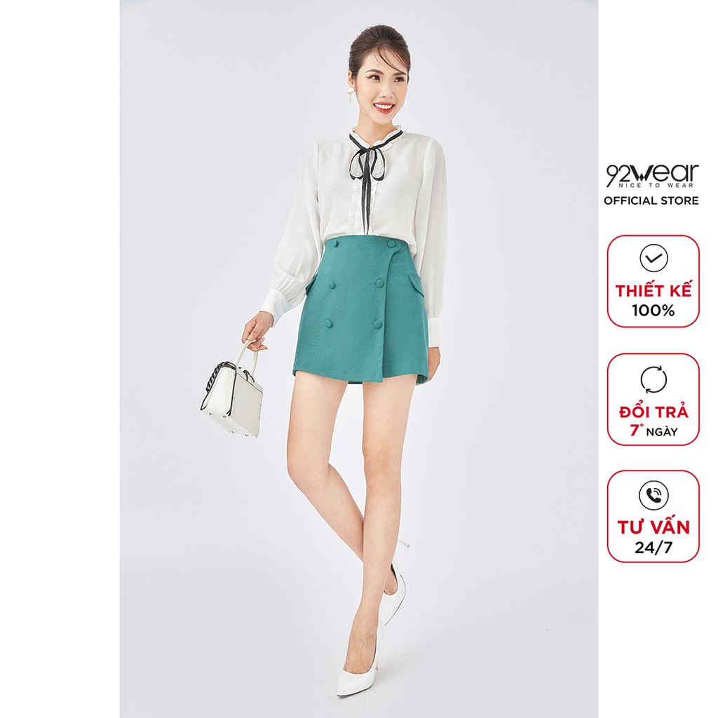 Chân váy ngắn chữ A 92WEAR cạp cao xẻ tà đính cúc bọc công sở JAA1605 | BigBuy360 - bigbuy360.vn