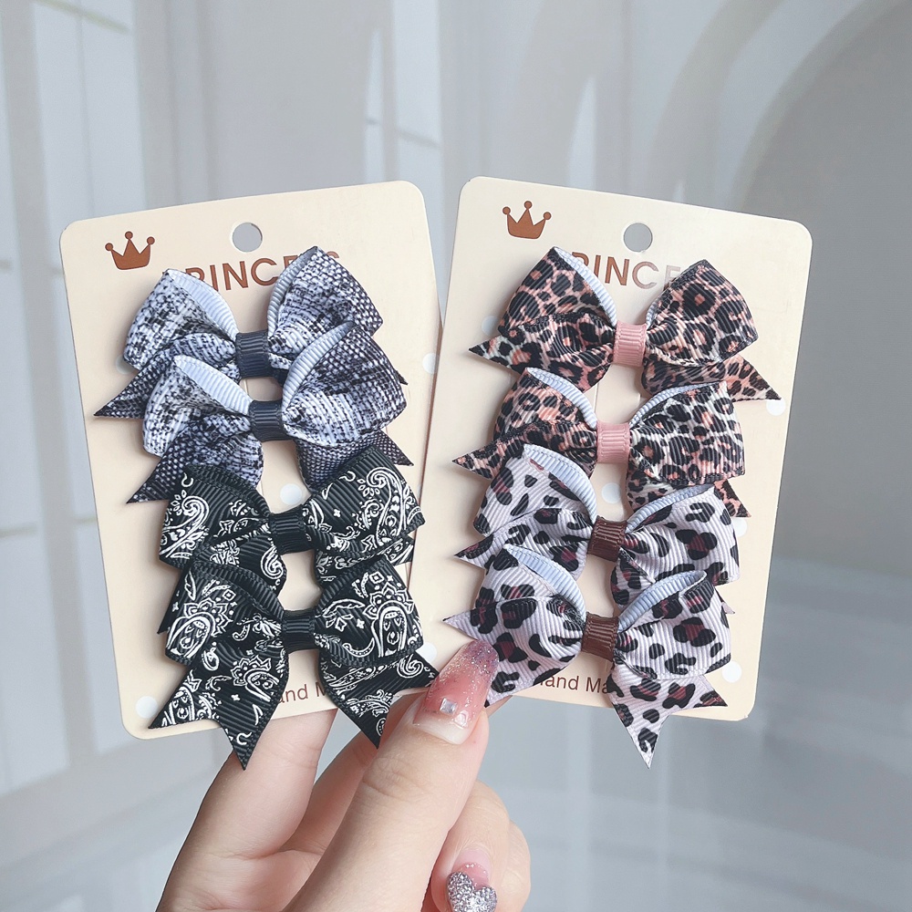 Kẹp tóc KIDSBOWS đính nơ họa tiết da báo dễ thương cho bé gái 2.4&quot;