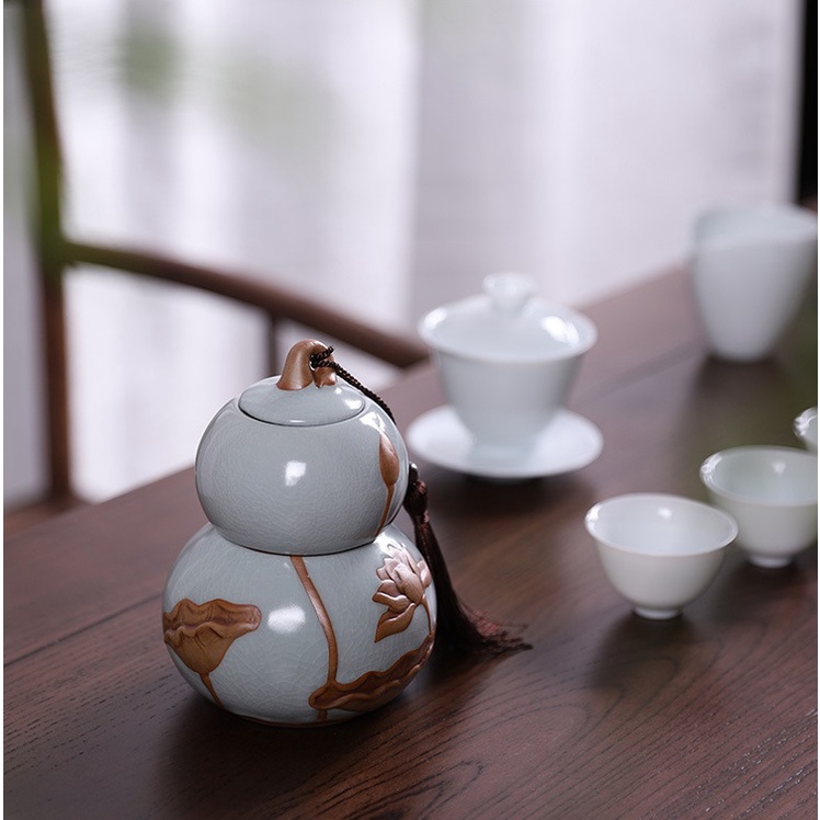 Hũ, Bình Đựng trà họa tiết hoa sen đắp nổi