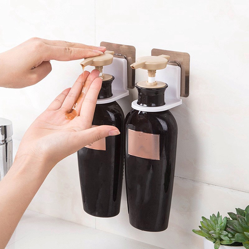 A space-saving multi-purpose kitchen / bathroom wall-mounted bottle holder