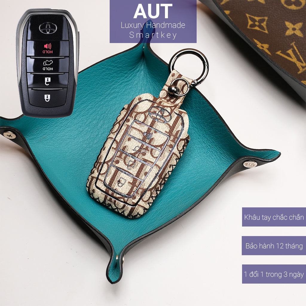 Ốp da chìa khóa ô tô Toyota Camry Fortuner Innova V Hilux G Land Cruiser 4 nút bấm Dior khâu tay TFO4 AD