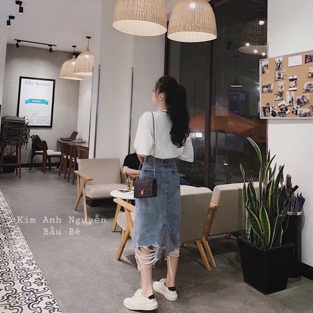 Chân váy  rách cúc trước