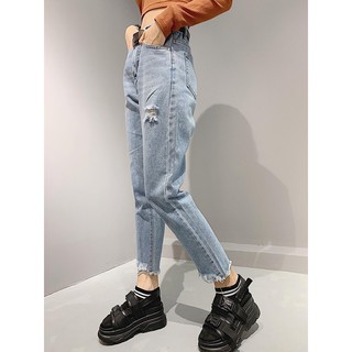 Quần jeans rách lai xếch