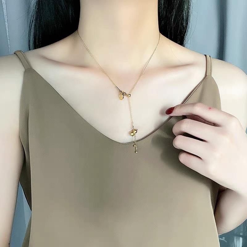 Vòng cổ thép titan mặt hình quả bầu màu vàng thời trang