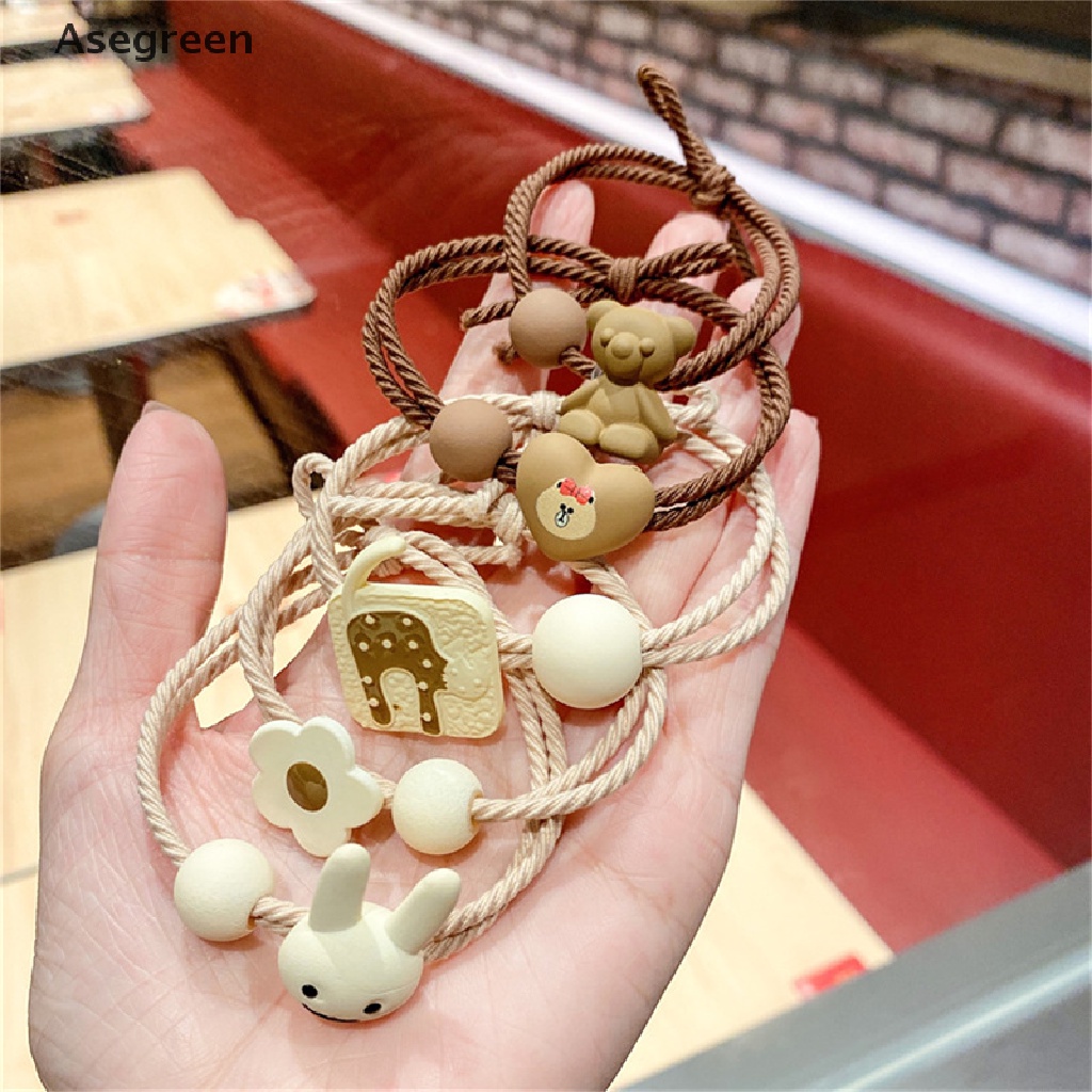Dây Cột Tóc Cao Su Co Giãn Đính Bóng Lông Hoạt Hình Cho Nữ