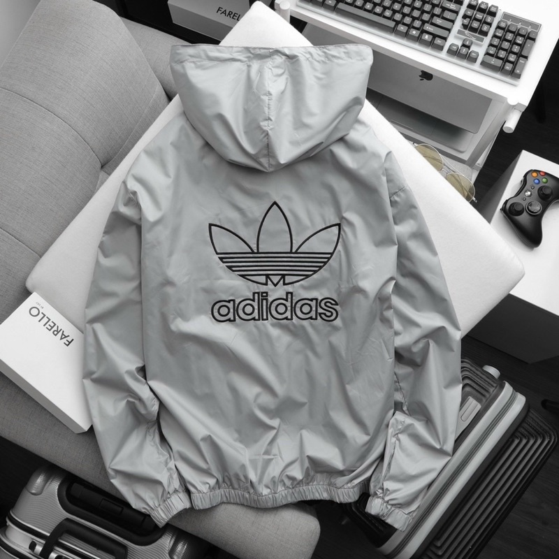 Áo khoác gió có mũ ad 2 lớp lót lưới thoáng khí