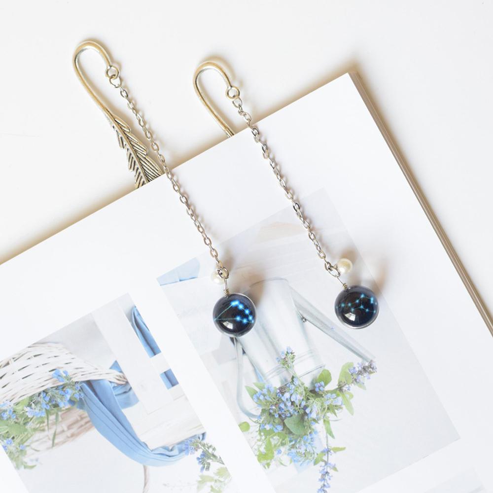 Bookmark Dạ Quang Bằng Kim Loại Hình Chiếc Lông Vũ Độc Đáo