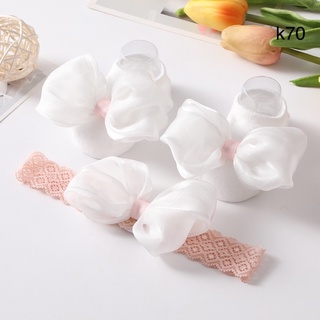 set băng đô và vớ dễ thương cho bé sơ sinh