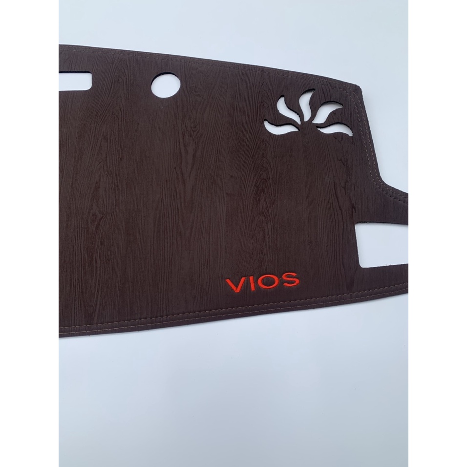 Thảm taplo da vân gỗ Vios 2019 - 2022, thảm taplo da vân gỗ may thiết kế theo xe Vios 2019 - 2022 cao cấp hàng dày đẹp