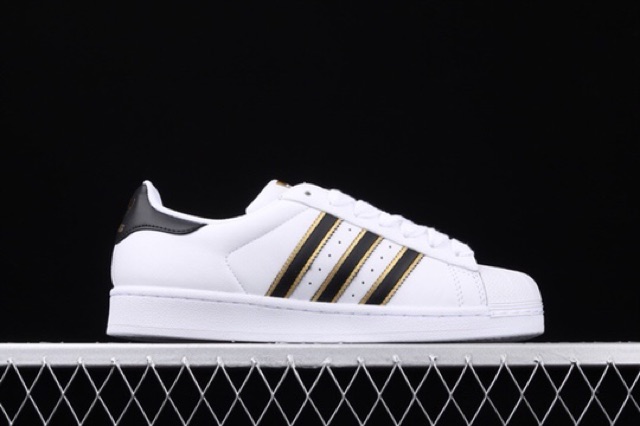 Giày Adidas Superstar trắng gót đen