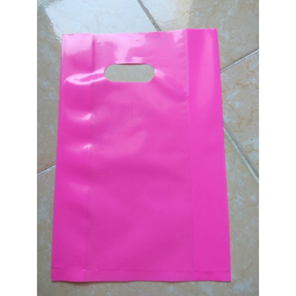 500g túi nilong đựng hàng hột xoài có quai xách PE dẻo bóng, túi shop màu hồng sen hồng đậm loại 1