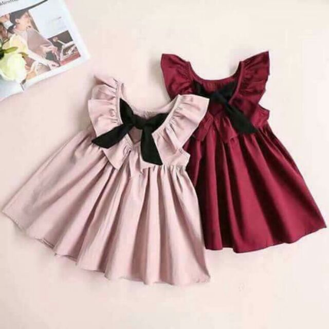 Váy buộc nơ lưng cho bé gái (sẵn đỏ đun sz 120)