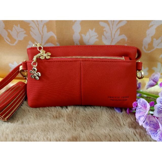 Túi xách da đeo chéo màu đỏ