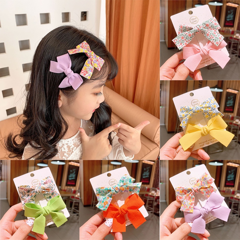 Bộ 2 Kẹp Tóc Đính Nơ Xinh Xắn Dành Cho Nữ