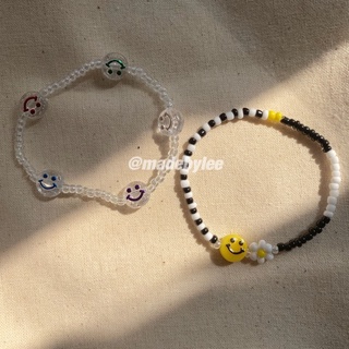 Vòng tay hạt cườm trắng đen mặt cười vàng hoa Daisy Vòng tay mặt cười trong MADEBYLEE