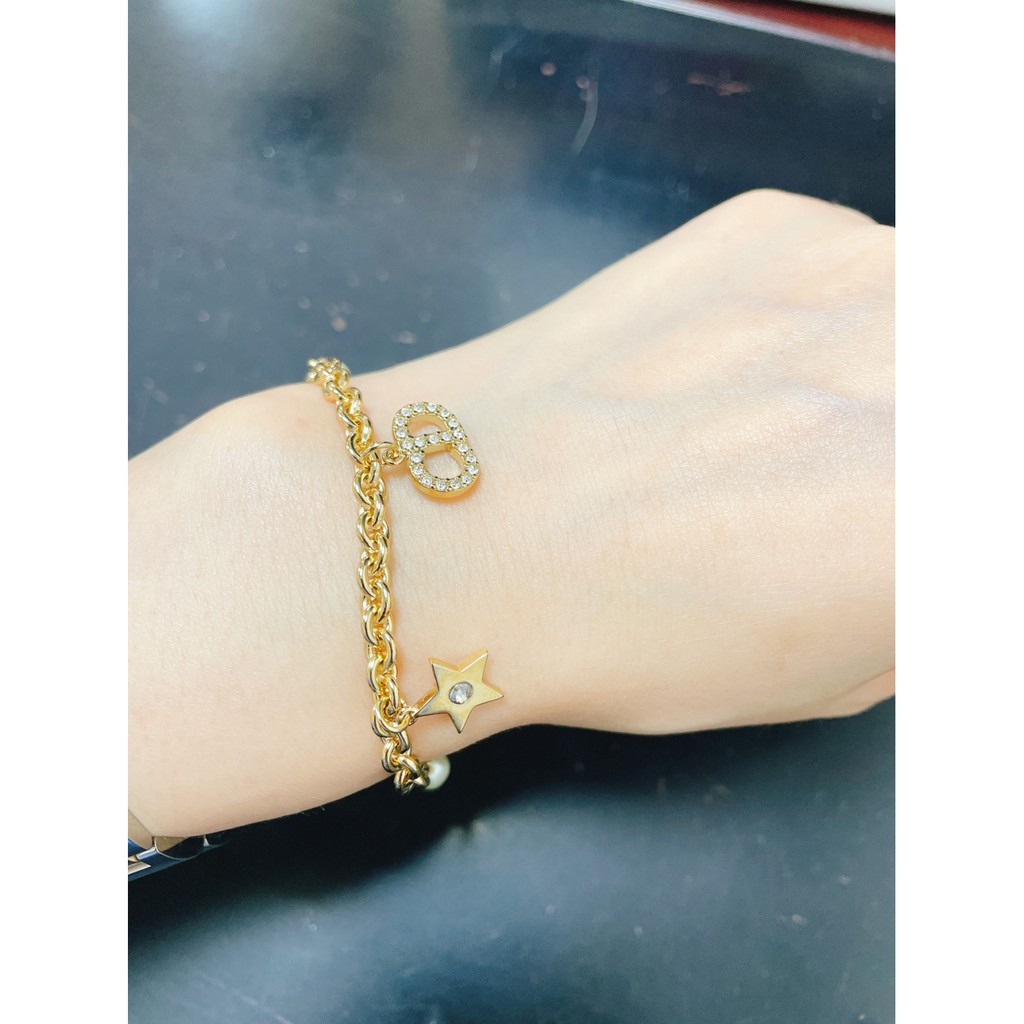 Vòng tay  phối hạt ngọc trai và ngôi sao phong cách retro sang trọng