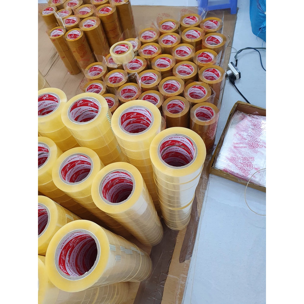 Băng dính 0.35kg/ 1 cuộn dán thùng, đóng hàng giá tại xưởng