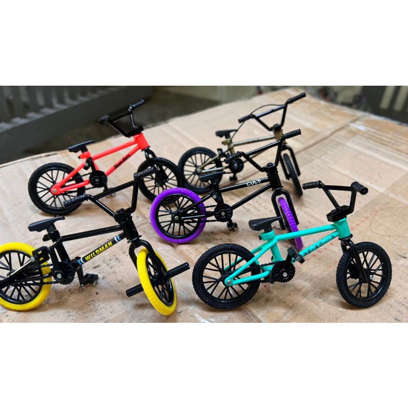 Mô hình xe đạp địa hình Tech dech hãng Spin Master màu đỏ cam