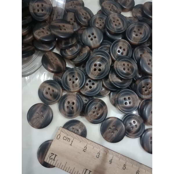 Cúc nhựa size 1.8cm.