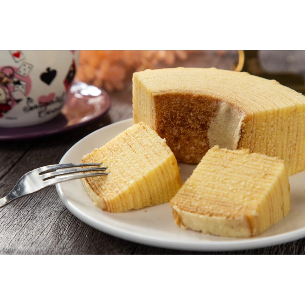 Bánh bông lan cuộn nguyên cái Marukin Baumkuchen 310g nội địa Nhật Bản