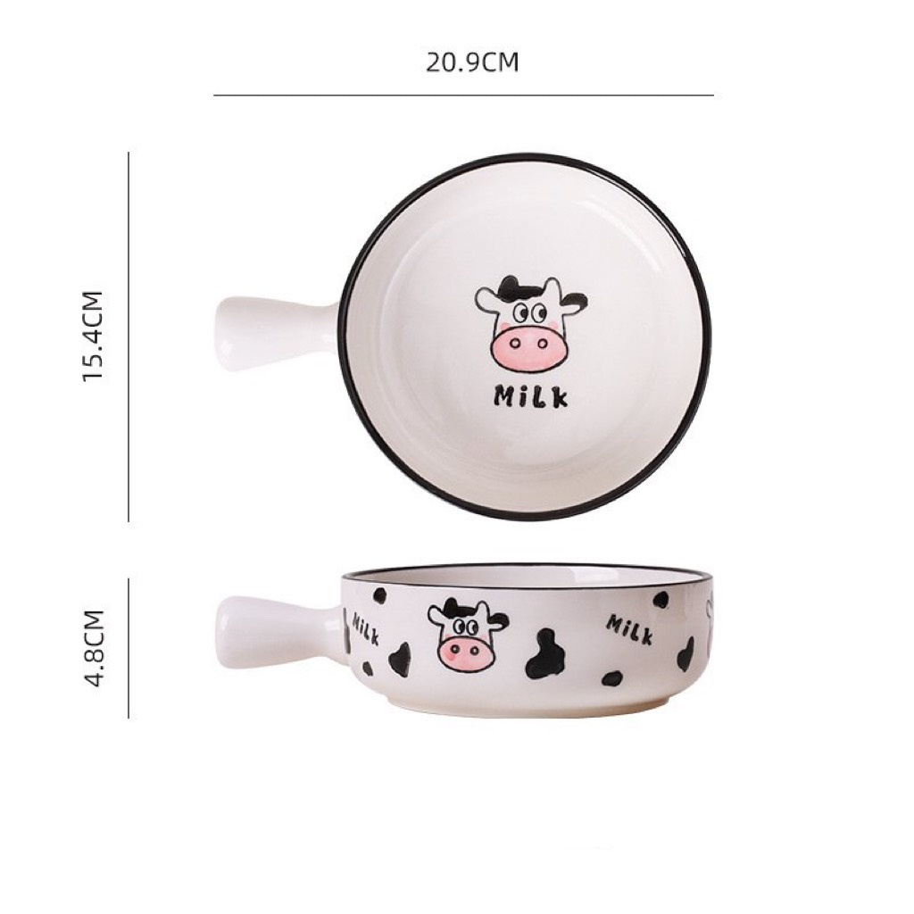 Tô sứ có tay cầm cute họa tiết con bò cười siêu cute. Bát sứ tay cầm decor bàn ăn sống ảo.