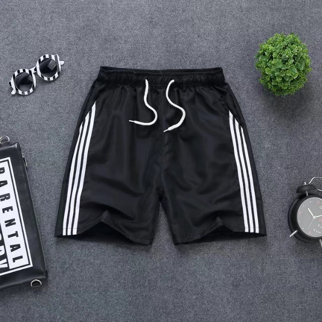Quần đùi nam vải gió thể thao năng động mặc ở nhà, đi chơi thể thao họa tiết 3 vạch dọc theo quần 2019