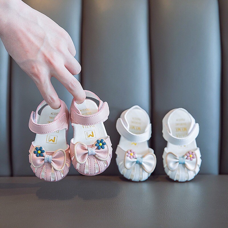 Sandal nơ dọ kèm bông hoa nhỏ mã K9938