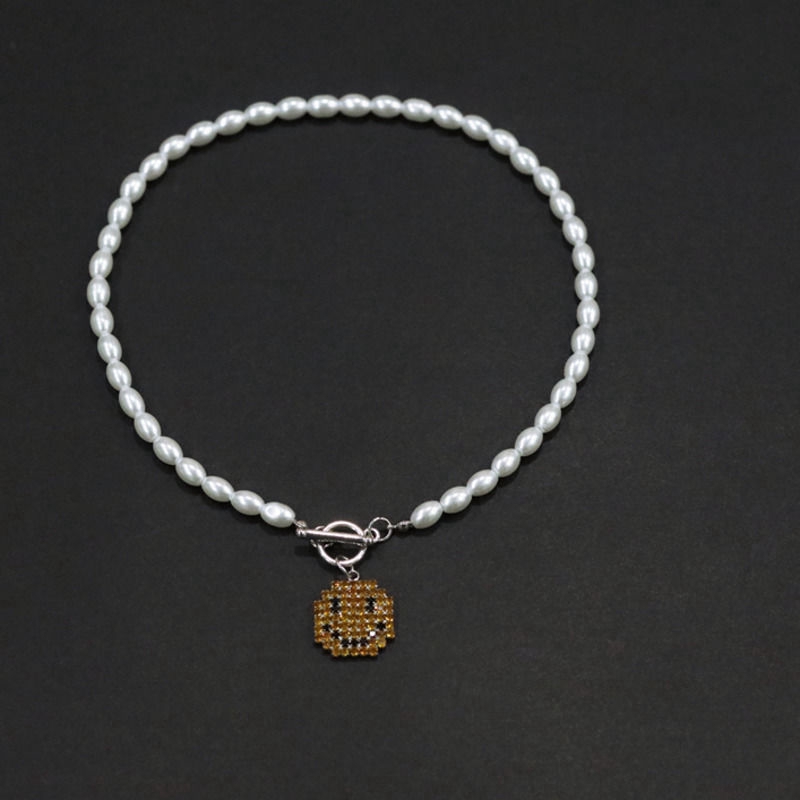 Dây chuyền ngọc trai thiết kế đơn giản phối mặt hình mặt cười xinh xắn