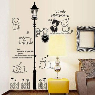 Decal dán tường mèo béo bên cột đèn