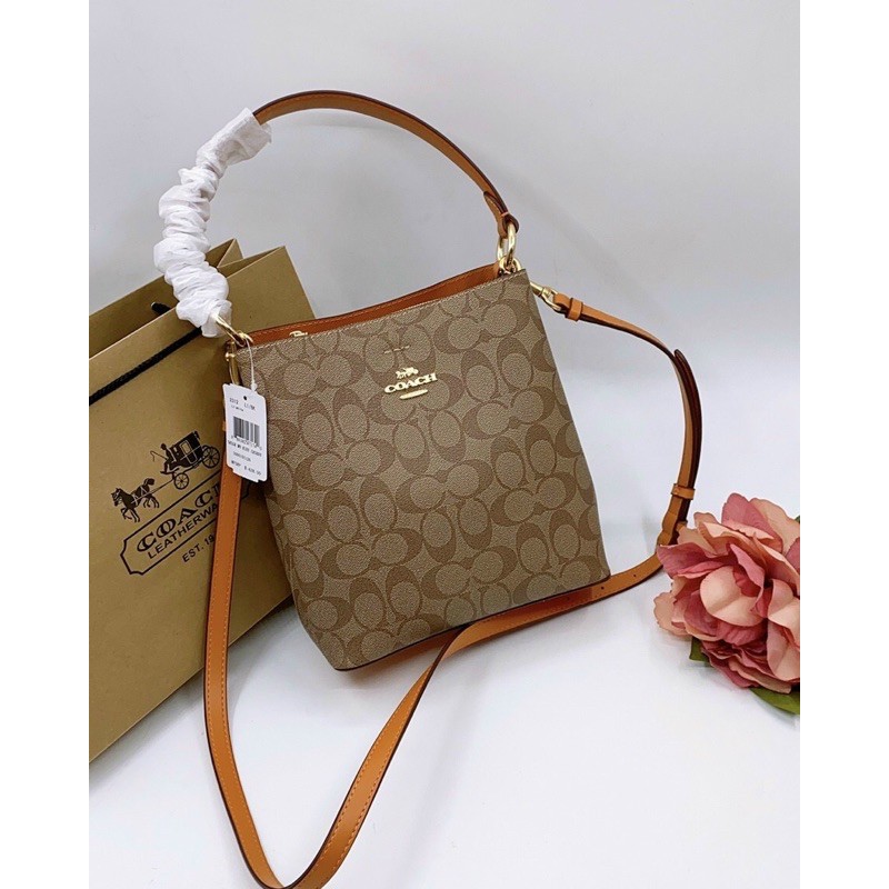 Túi Coach da thật pha canvas dáng ống màu mới