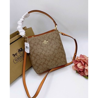 Túi Coach da thật pha canvas dáng ống màu mới