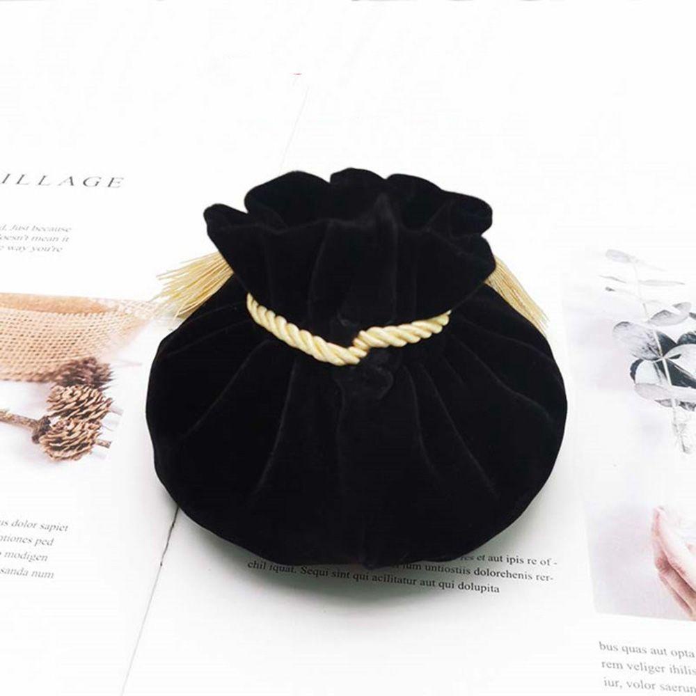 Túi Nhung Đựng Trang Sức Đế Tròn Phối Tua Rua Xinh Xắn