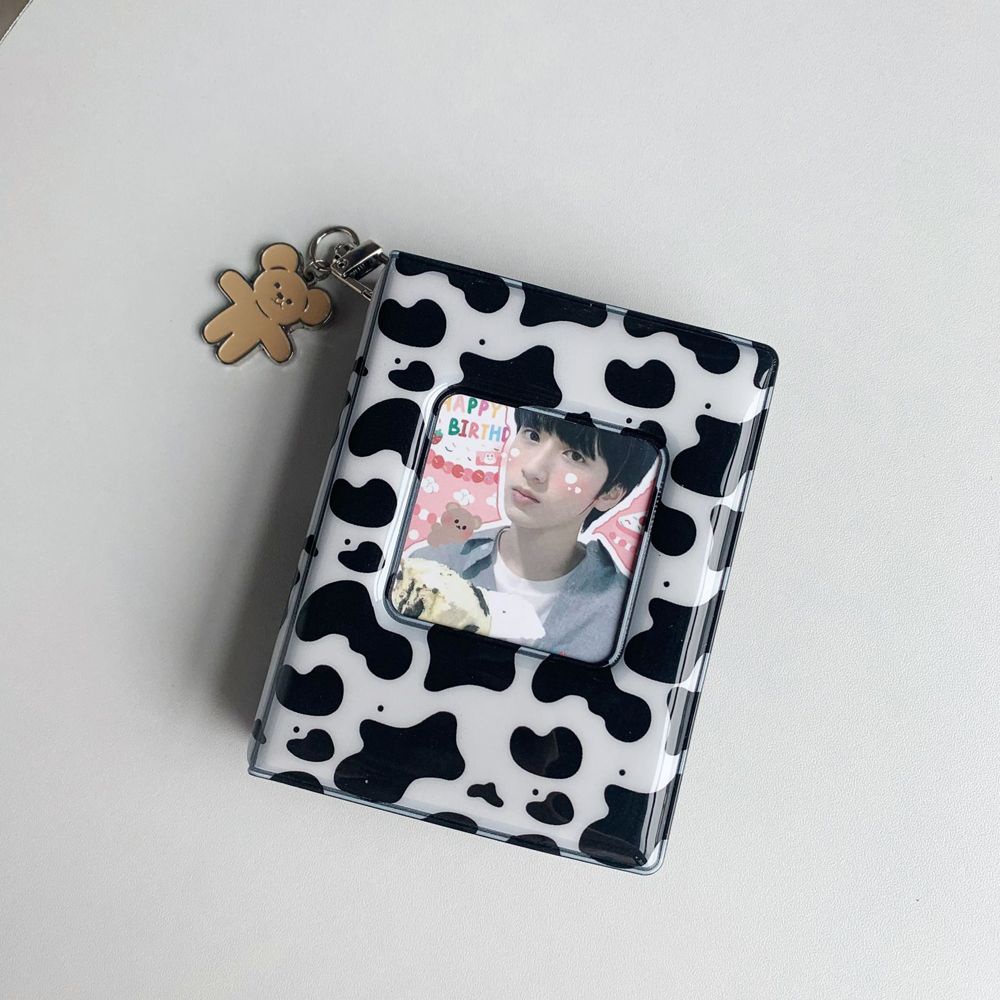 Album đựng ảnh mini gồm 16 trang thiết kế bìa họa tiết bò sữa kích cỡ 8.5×11×2.6cm