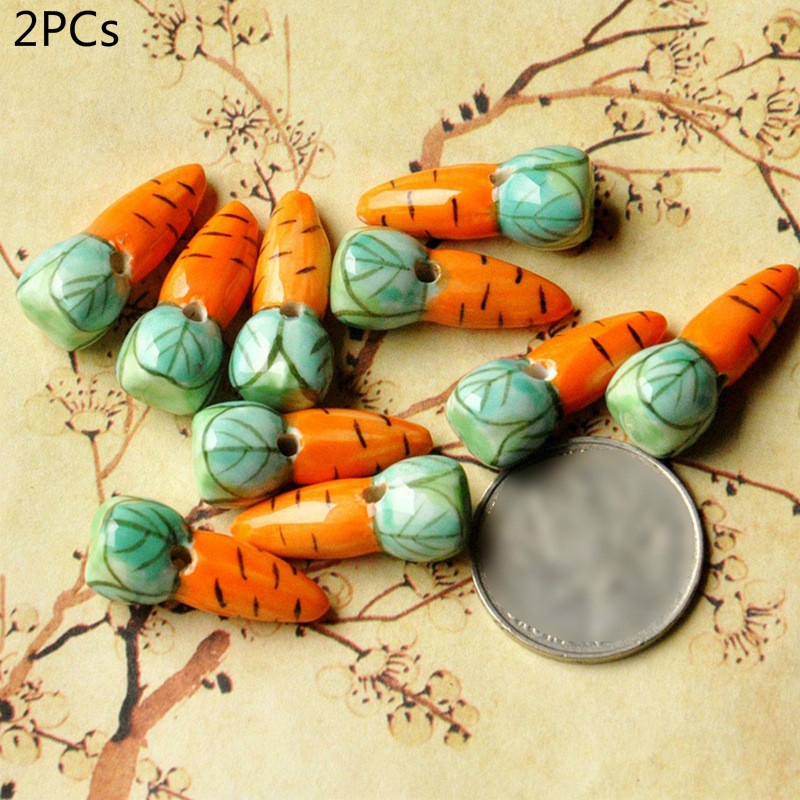 Set 2 hạt xỏ bằng gốm sứ hình củ cà rốt phong cách Trung Hoa làm trang sức