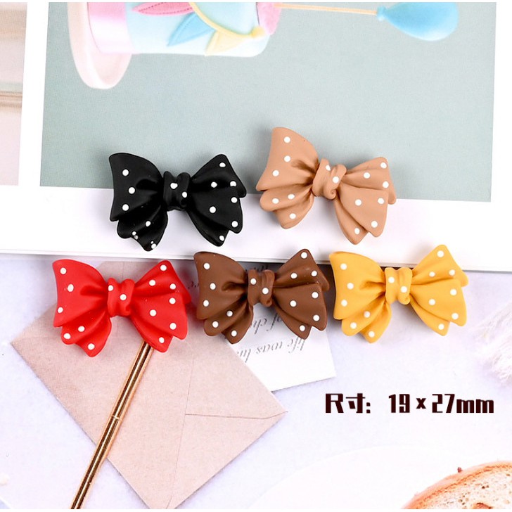 Mô hình nơ chấm bi trang trí búp bê