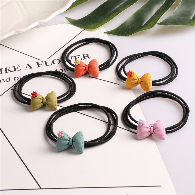 Cột tóc nơ xinh đủ màu lựa chọn