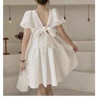 Váy trắng xoè thắt nơ sau lưng, đầm trắng dáng babydoll xốp nhẹ bồng bềnh siêu xinh. miala shop