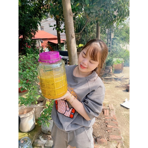 Cốt gừng nghệ gấc hạ thổ 6 tháng toàn thân cho mẹ sau sinh trắng da mờ thâm sạm an toàn chai 1 lít