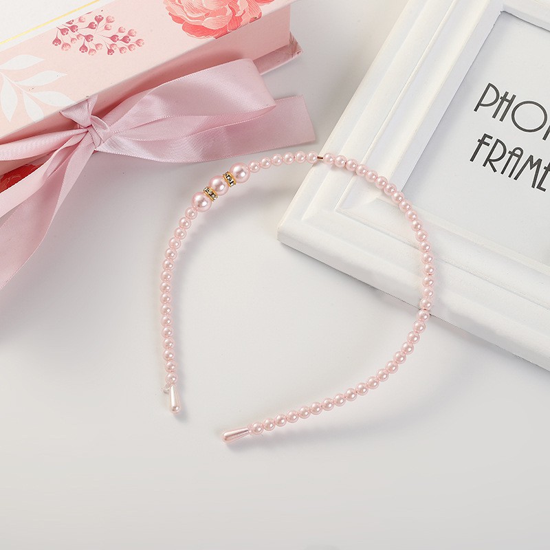 Cài tóc ngọc trai xinh xắn cho bé gái